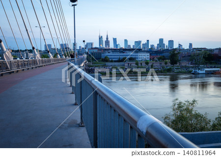 A bridge over the Vistula River with a view of the center of Warsaw A bridge over the Vistula River with a view of the center of Warsaw 140811964