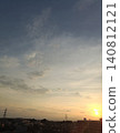 A beautiful sunset sinking into a residential area, and a sky with a gradient of colors. 140812121