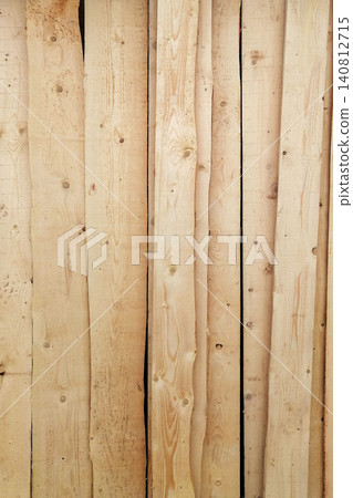 clean wooden boards without bark arranged vertically in a row clean wooden boards without bark arranged vertically in a row 140812715