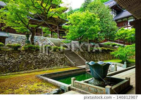 View from the main gate of Eihei-ji Temple towards the Chujakumon Gate and the Buddha Hall. View from the main gate of Eihei-ji Temple towards the Chujakumon Gate and the Buddha Hall. 140812907