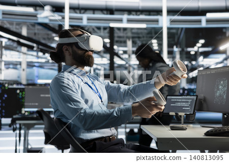 Data center technician uses a VR headset to configure server virtualization and AI automation systems in a data center. Data center technician uses a VR headset to configure server virtualization and AI automation systems in a data center. 140813095