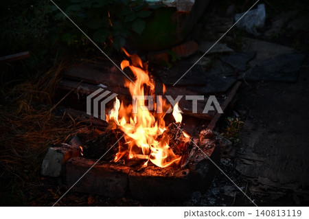 Halloween Witch . Fire embers particles over black background. Fire sparks background. Abstract dark glitter fire particles Halloween Witch . Fire embers particles over black background. Fire sparks background. Abstract dark glitter fire particles 140813119