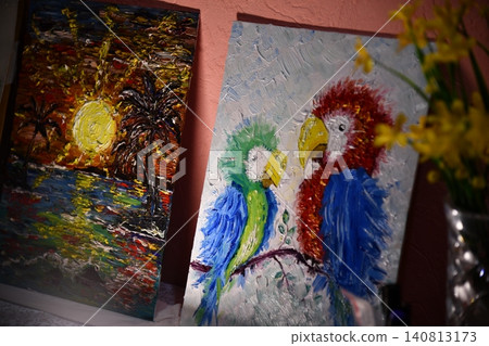 Artist Works on Abstract Oil Painting, Moving Paint Brush Energetically She Creates Modern Masterpiece. Dark Creative Studio where Large Canvas Stands on Easel Illuminated. Low Angle Artist Works on Abstract Oil Painting, Moving Paint Brush Energetically She Creates Modern Masterpiece. Dark Creative Studio where Large Canvas Stands on Easel Illuminated. Low Angle 140813173
