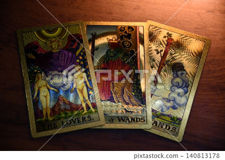 Hand holding tarot card with candlelight on the darkness background for Astrology Occult Magic illustration - Magic Hand holding tarot card with candlelight on the darkness background for Astrology Occult Magic illustration - Magic 140813178