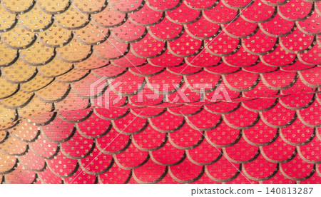 Red and yellow fabric as a background macro photo. Red and yellow fabric as a background macro photo. 140813287