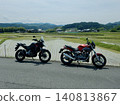motorcycle running in the countryside 140813867