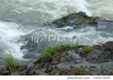 Mountain stream and mossy rocks Mountain stream and mossy rocks 140814099