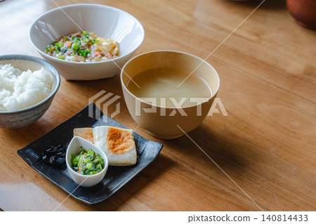 Japanese breakfast menu with one soup and three side dishes 140814433