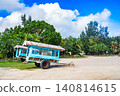 A landscape of water buffalo carts and subtropical plants on Yubu Island in the Yaeyama Islands of Okinawa Prefecture. 140814615