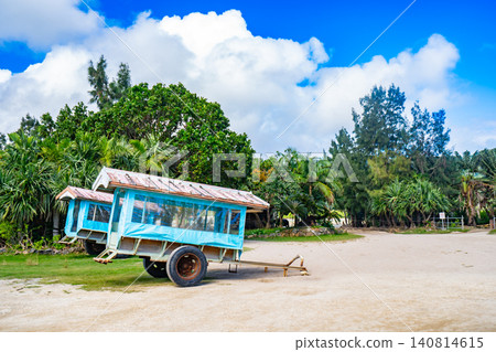 A landscape of water buffalo carts and subtropical plants on Yubu Island in the Yaeyama Islands of Okinawa Prefecture. A landscape of water buffalo carts and subtropical plants on Yubu Island in the Yaeyama Islands of Okinawa Prefecture. 140814615