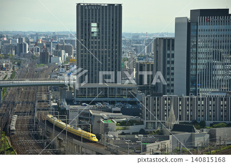 An aerial view of the cityscape around Nagoya Station and the Doctor Yellow 923 train. An aerial view of the cityscape around Nagoya Station and the Doctor Yellow 923 train. 140815168