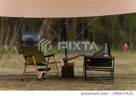A relaxing space for solo camping, set up under the tarp. A relaxing space for solo camping, set up under the tarp. 140815426