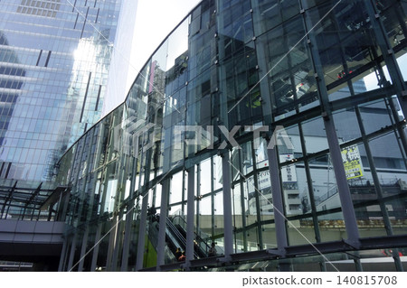 The sky visible through the canyons of redevelopment buildings in front of Shibuya Station The sky visible through the canyons of redevelopment buildings in front of Shibuya Station 140815708