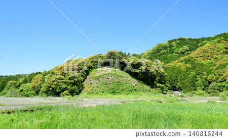 A lush, green rural landscape in the season of fresh green leaves. 140816244