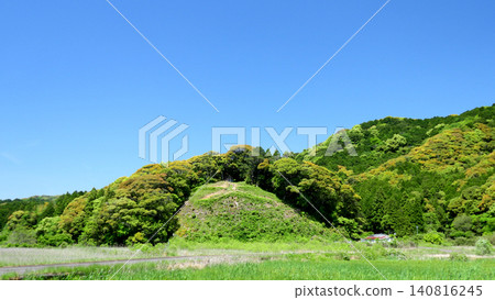 A lush, green rural landscape in the season of fresh green leaves. A lush, green rural landscape in the season of fresh green leaves. 140816245
