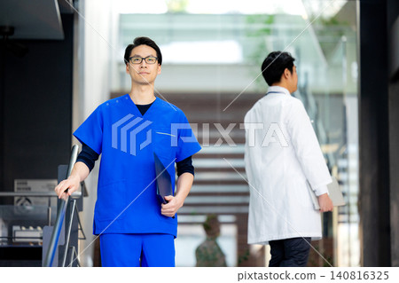 Male nurse working at a hospital Male nurse working at a hospital 140816325