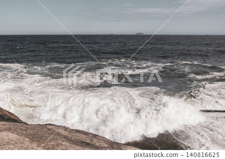 Ipanema Beach Water Waves and Rocks Rio de Janeiro Brazil. 140816625