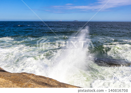 Ipanema Beach Water Waves and Rocks Rio de Janeiro Brazil. 140816708