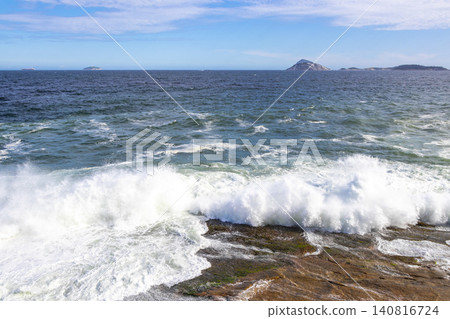 Ipanema Beach Water Waves and Rocks Rio de Janeiro Brazil. 140816724