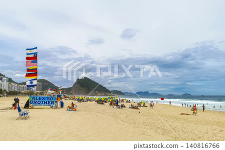 Copacabana Leme Beach Parasols Flags People Rio de Janeiro Brazil. 140816766