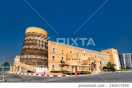 The traditional clay fortress architecture of the Heritage Village in Dammam, Saudi Arabia, against a clear blue sky The traditional clay fortress architecture of the Heritage Village in Dammam, Saudi Arabia, against a clear blue sky 140817048