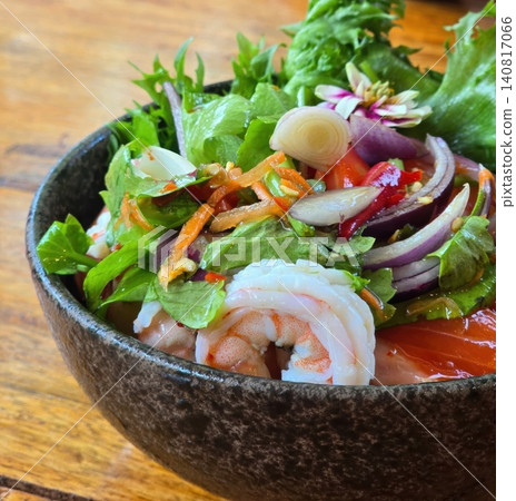 Thai Spicy Seafood Salad with Fresh Shrimp and Salmon in a Bowl Thai Spicy Seafood Salad with Fresh Shrimp and Salmon in a Bowl 140817066