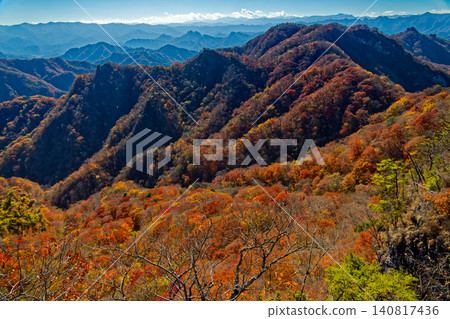 Autumn foliage of the mountains of western Joshu as seen from the Ura-Myogi and Tanikyu mountain ridges. Autumn foliage of the mountains of western Joshu as seen from the Ura-Myogi and Tanikyu mountain ridges. 140817436
