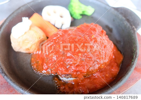 Photo stock images of hamburgers with tomato sauce, suitable for restaurant menus. 140817689