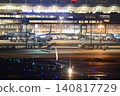 Airplane parked at the night airport Airplane parked at the night airport 140817729