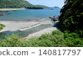 A scene of early summer in an inlet into which a small river flows. 140817797