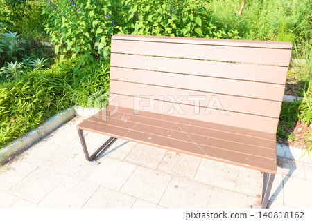 Bright park bench photo stock image, perfect for images of taking a break or strolling. Bright park bench photo stock image, perfect for images of taking a break or strolling. 140818162