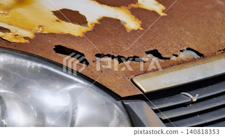 Rusted car hood with corrosion and damaged metal texture in Moscow Rusted car hood with corrosion and damaged metal texture in Moscow 140818353