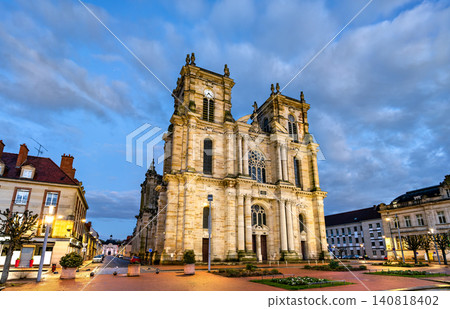 The grand facade and twin towers of the Collegiate Church of Our Lady of the Assumption at twilight in Vitry le Francois, France. The grand facade and twin towers of the Collegiate Church of Our Lady of the Assumption at twilight in Vitry le Francois, France. 140818402