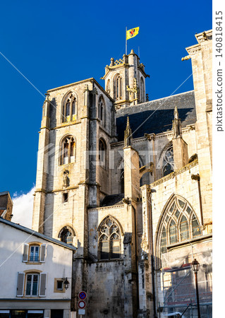 Detailed view of the gothic architecture and towers of Saint Gengoult Collegiate Church under a clear blue sky in Toul, Meurthe et Moselle, France Detailed view of the gothic architecture and towers of Saint Gengoult Collegiate Church under a clear blue sky in Toul, Meurthe et Moselle, France 140818415