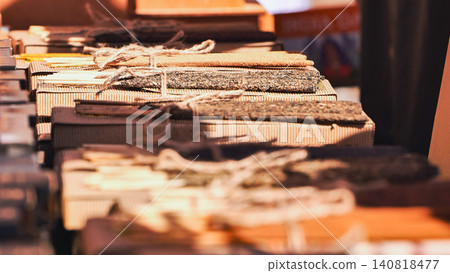 Bundles of hand-rolled incense sticks for sale at India Day cultural festival in Moscow Bundles of hand-rolled incense sticks for sale at India Day cultural festival in Moscow 140818477