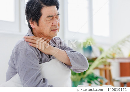 Senior man suffering from stiff shoulders and poor health Senior man suffering from stiff shoulders and poor health 140819151