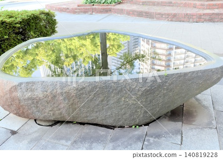 Photographic stock images of water surface reflections and stone water basins, suitable for use in urban parks and exterior landscaping. Photographic stock images of water surface reflections and stone water basins, suitable for use in urban parks and exterior landscaping. 140819228