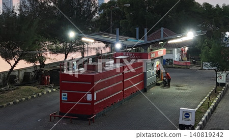 High-angle view of a red portable gas station 140819242