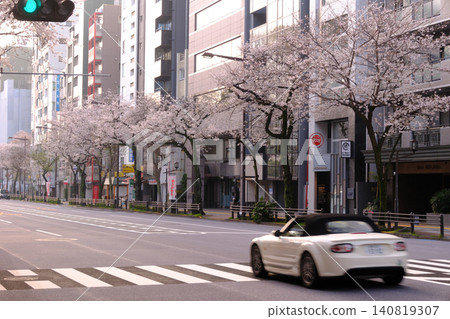 Cars passing through the Arai Yakushi-mae intersection Cars passing through the Arai Yakushi-mae intersection 140819307