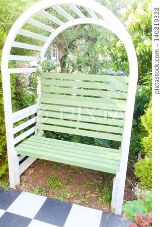 Photo of an arch bench that can be used in gardens and outdoor rest areas. Photo of an arch bench that can be used in gardens and outdoor rest areas. 140819328