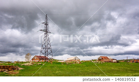 Stormy sky with birds flying above rural scene Stormy sky with birds flying above rural scene 140819552