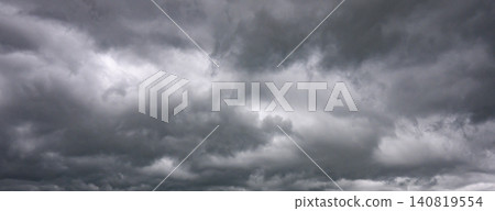 Gray storm clouds moving overhead in dramatic sky Gray storm clouds moving overhead in dramatic sky 140819554