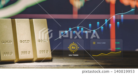 Digital gold and fintech concept. Gold bullion bars with virtual XAU token interface, cryptocurrency exchange graphs, and financial trading charts. 140819953