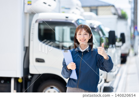 Female staff at a logistics company Female staff at a logistics company 140820654