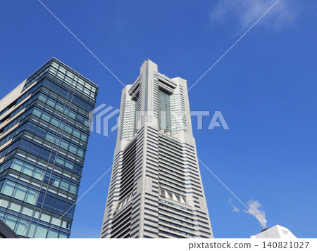 Looking up at the Landmark Tower against the blue sky. 140821027