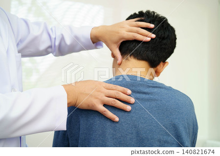Physical therapy, Asian therapist doctor treat perform pain therapy in hospital. Physical therapy, Asian therapist doctor treat perform pain therapy in hospital. 140821674