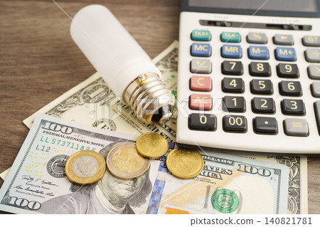 Cost of electric utilities with light bulb for payment. 140821781