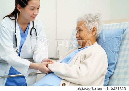 Asian doctor checking and treat elderly woman patient health in hospital. Asian doctor checking and treat elderly woman patient health in hospital. 140821813