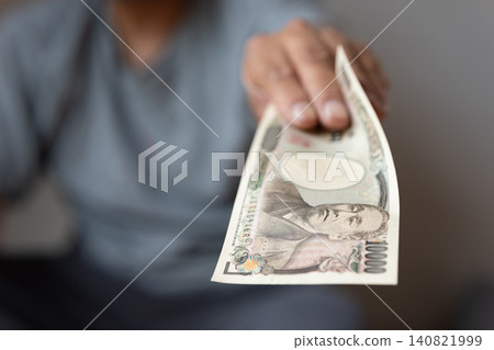 Handing over money Handing over money 140821999