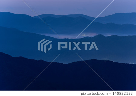 The morning sky and the silhouettes of the mountains The morning sky and the silhouettes of the mountains 140822152
